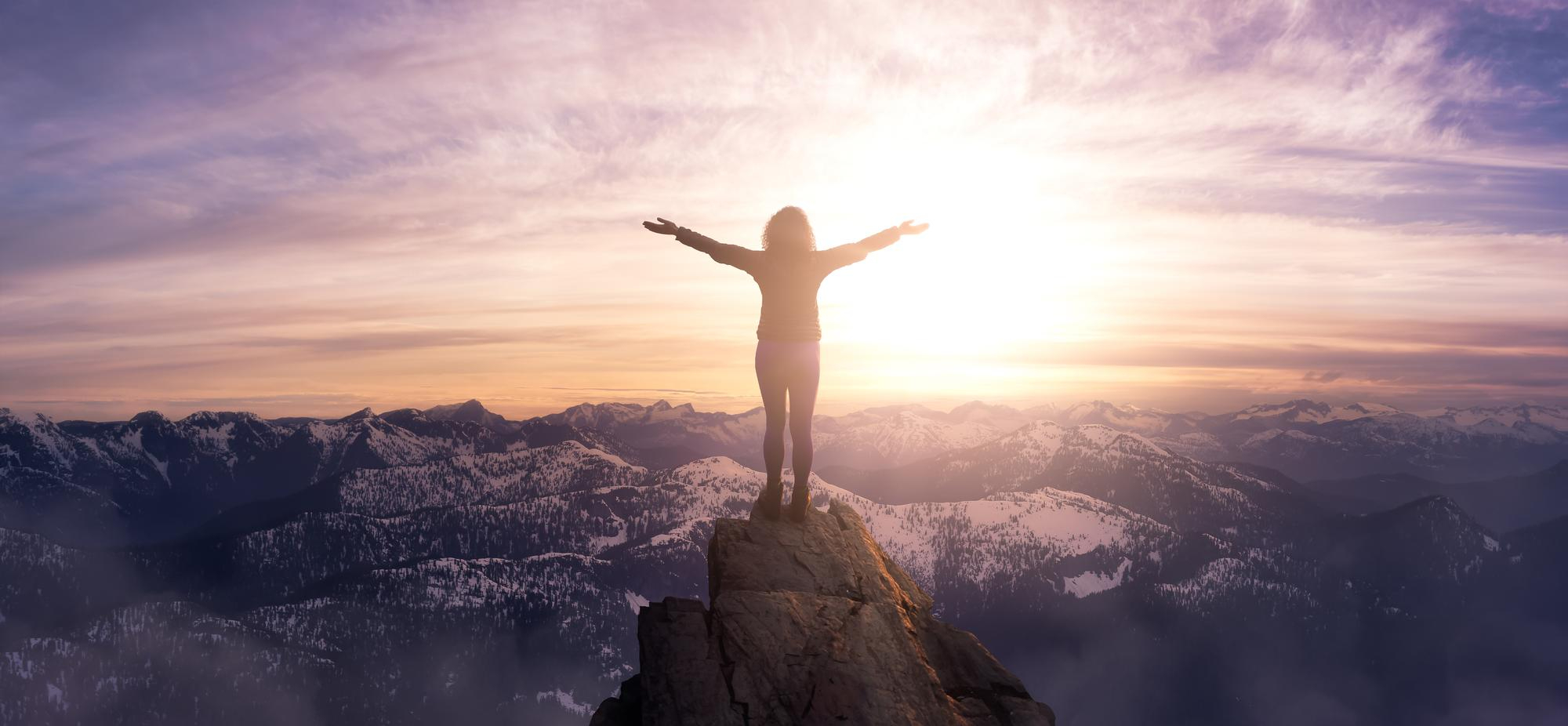 Rosewood Coaching Collective Empowered Woman Empowered Woman standing on top of a mountain. One on one coaching with Rosewood Coaching Collective Pacific Northwest